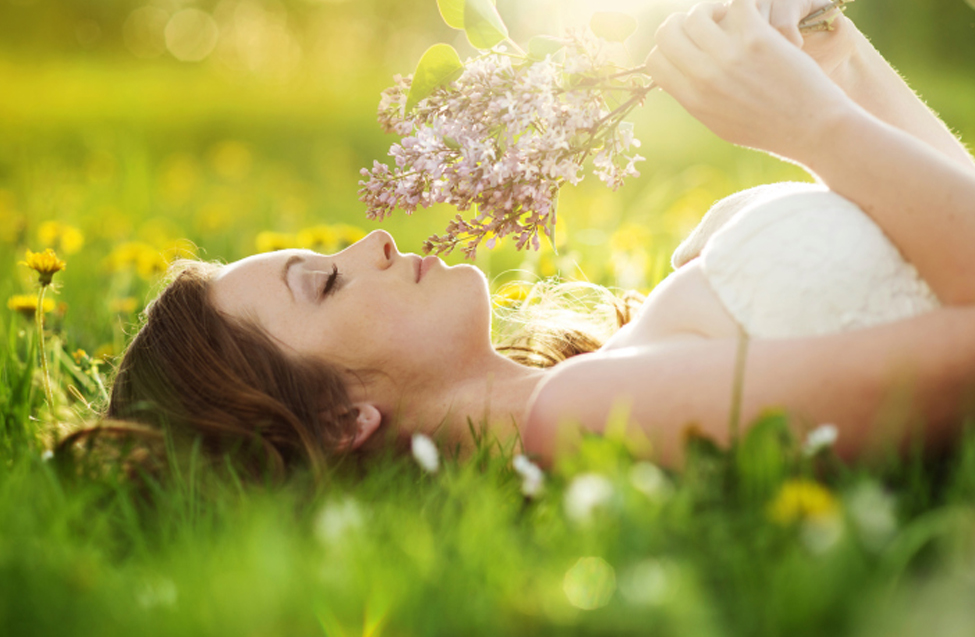 woman lying in grass