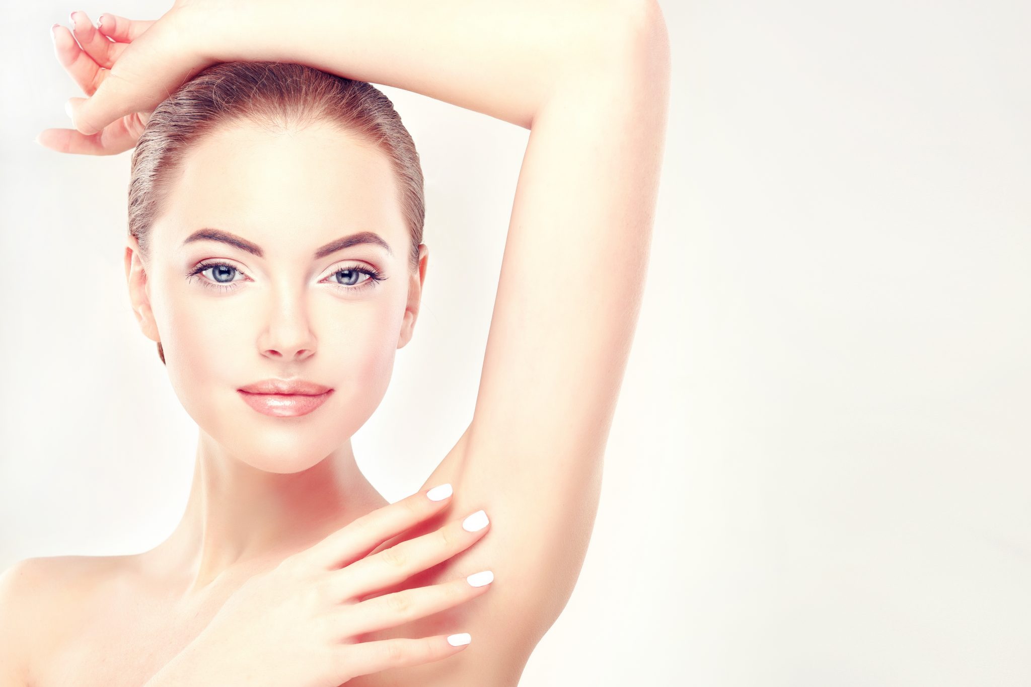beautiful woman with arm raised