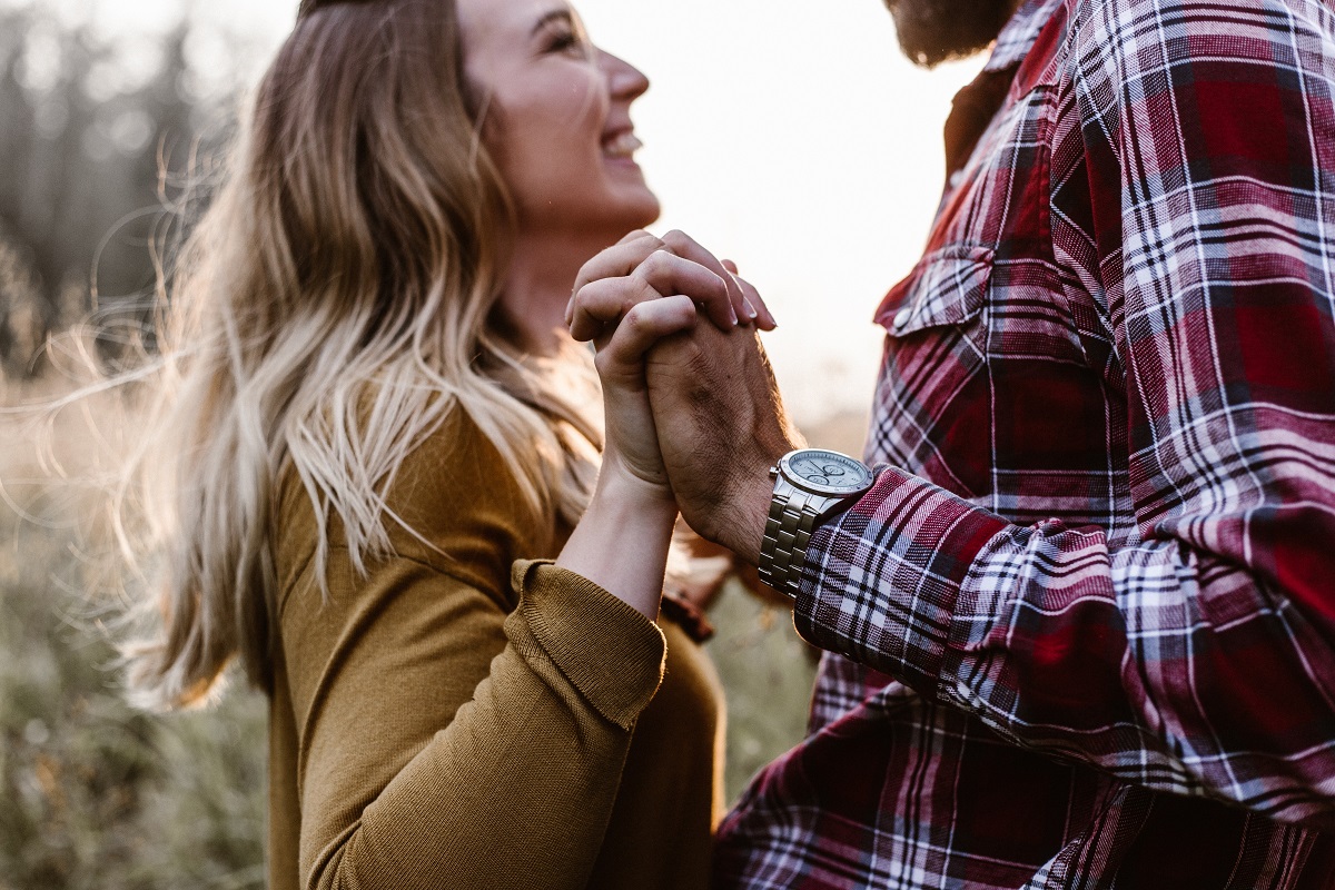 happy couple holding hands