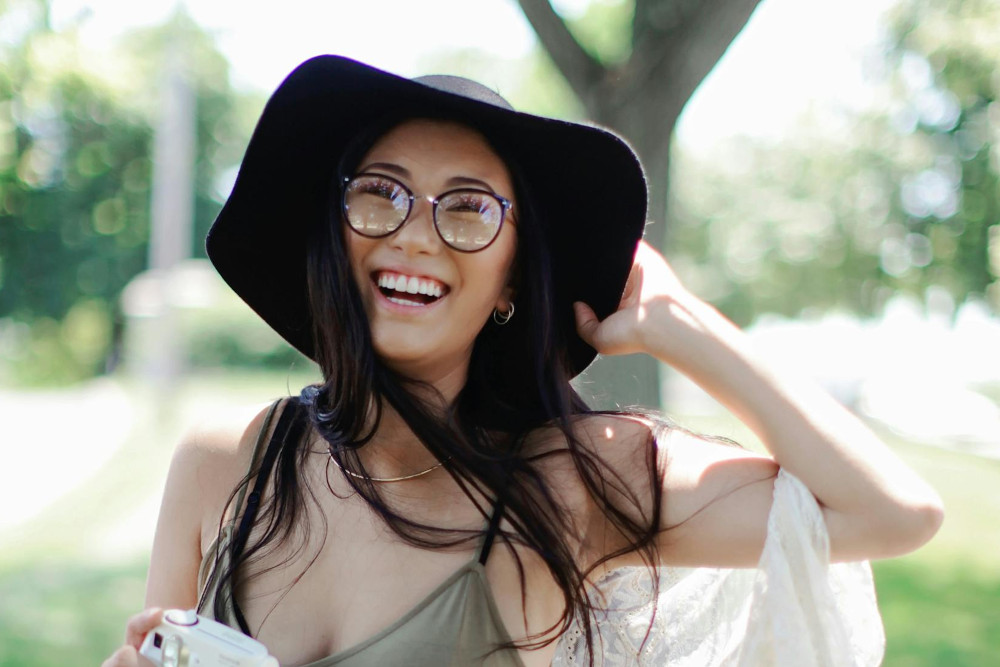 woman wearing hat